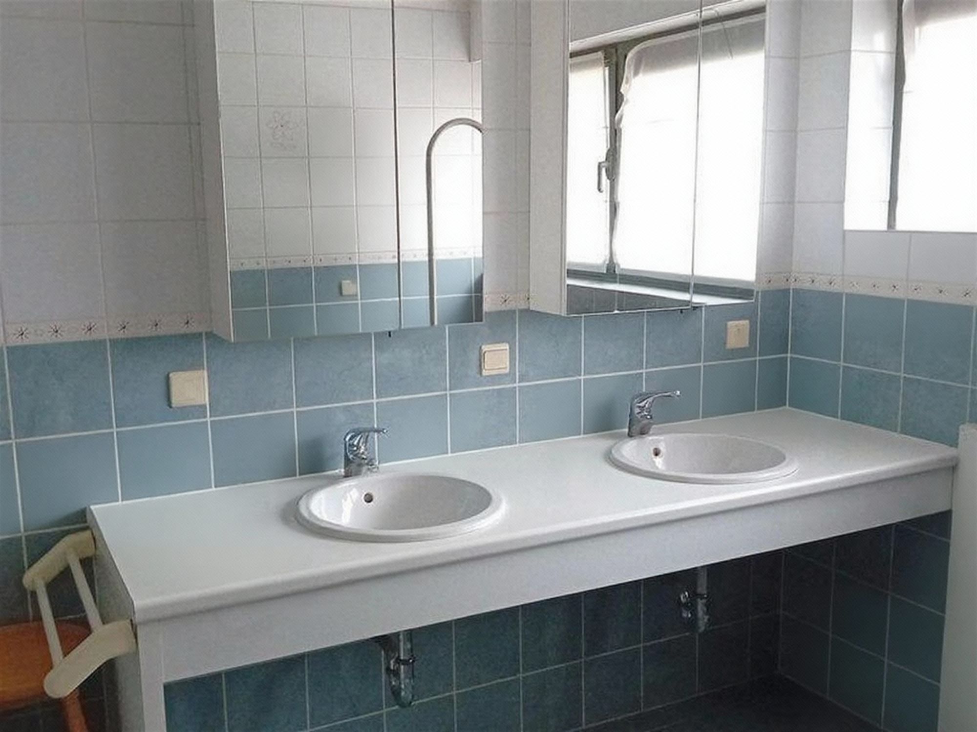 Rustig gelegen woning met 3 slaapkamers, garage en aangename tuin foto 10