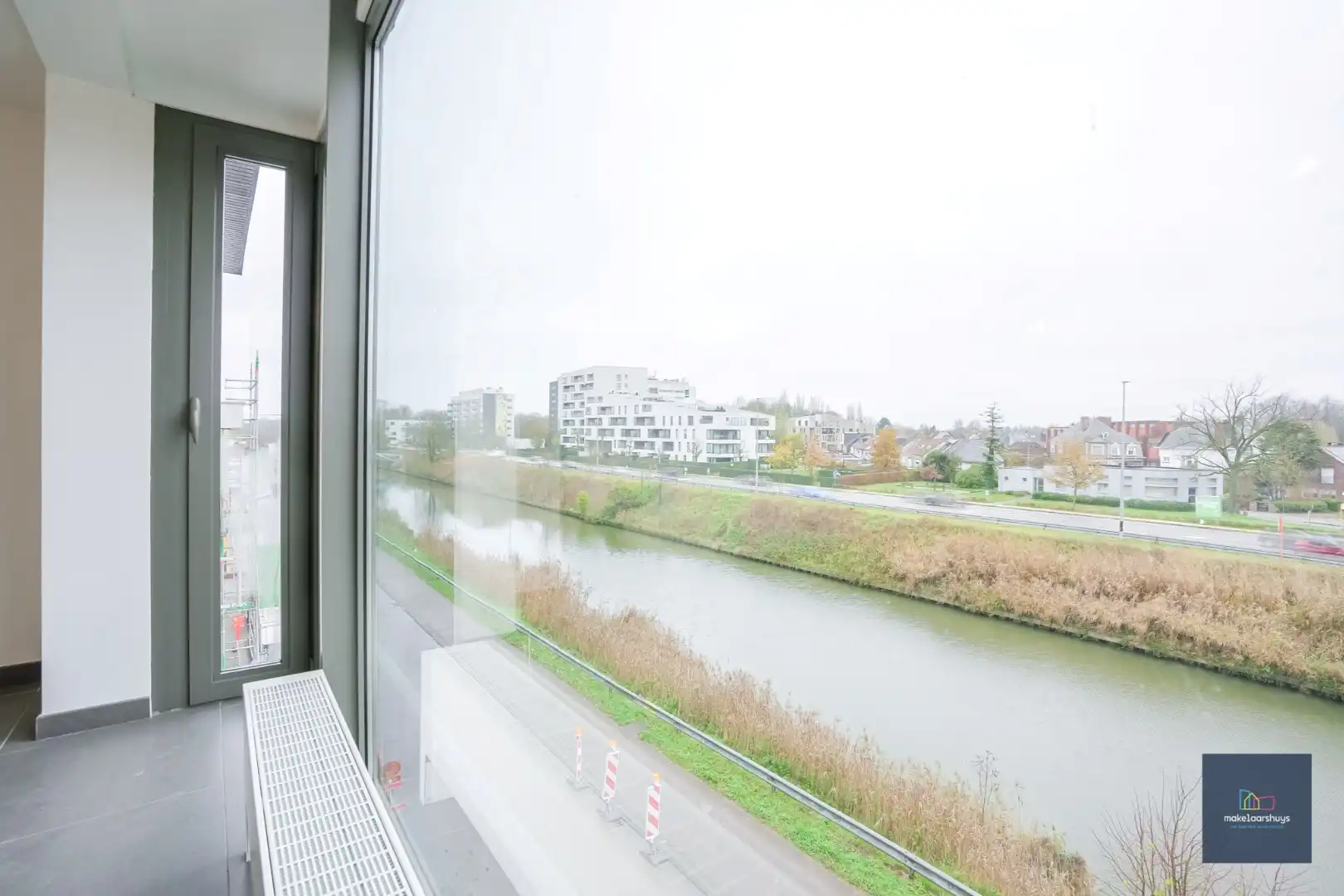 Ruim gelijkvloersappartement met 2 slaapkamers , een  zuidgeorienteerde  tuin en garage foto 8