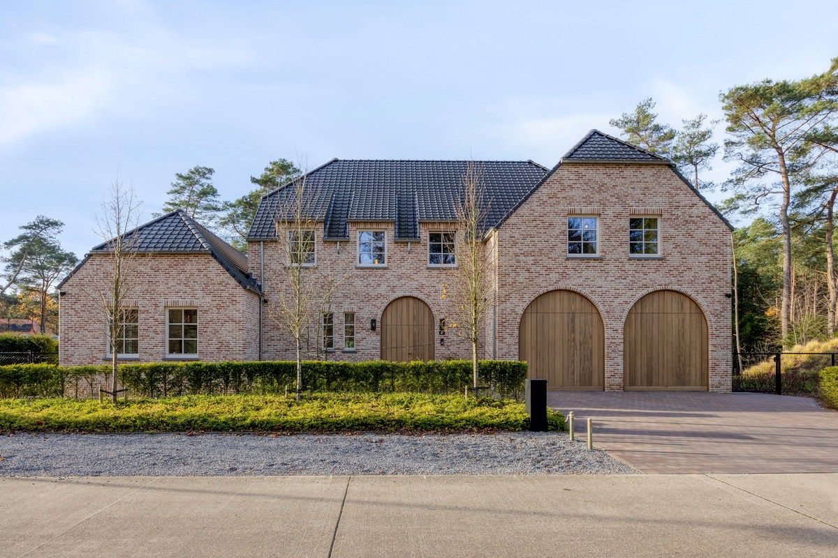 Ruim ingedeelde en kwalitatief afgewerkte villa op een mooi perceel met naastgelegen bouwgrond. foto 48