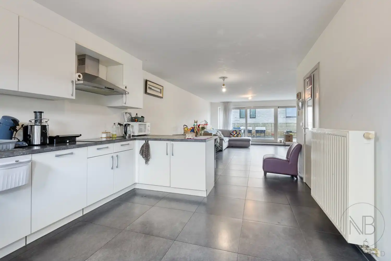 Ruim duplex appartement met 3 slaapkamers en groot terras in hartje Zutendaal foto {{pictureIndex}}