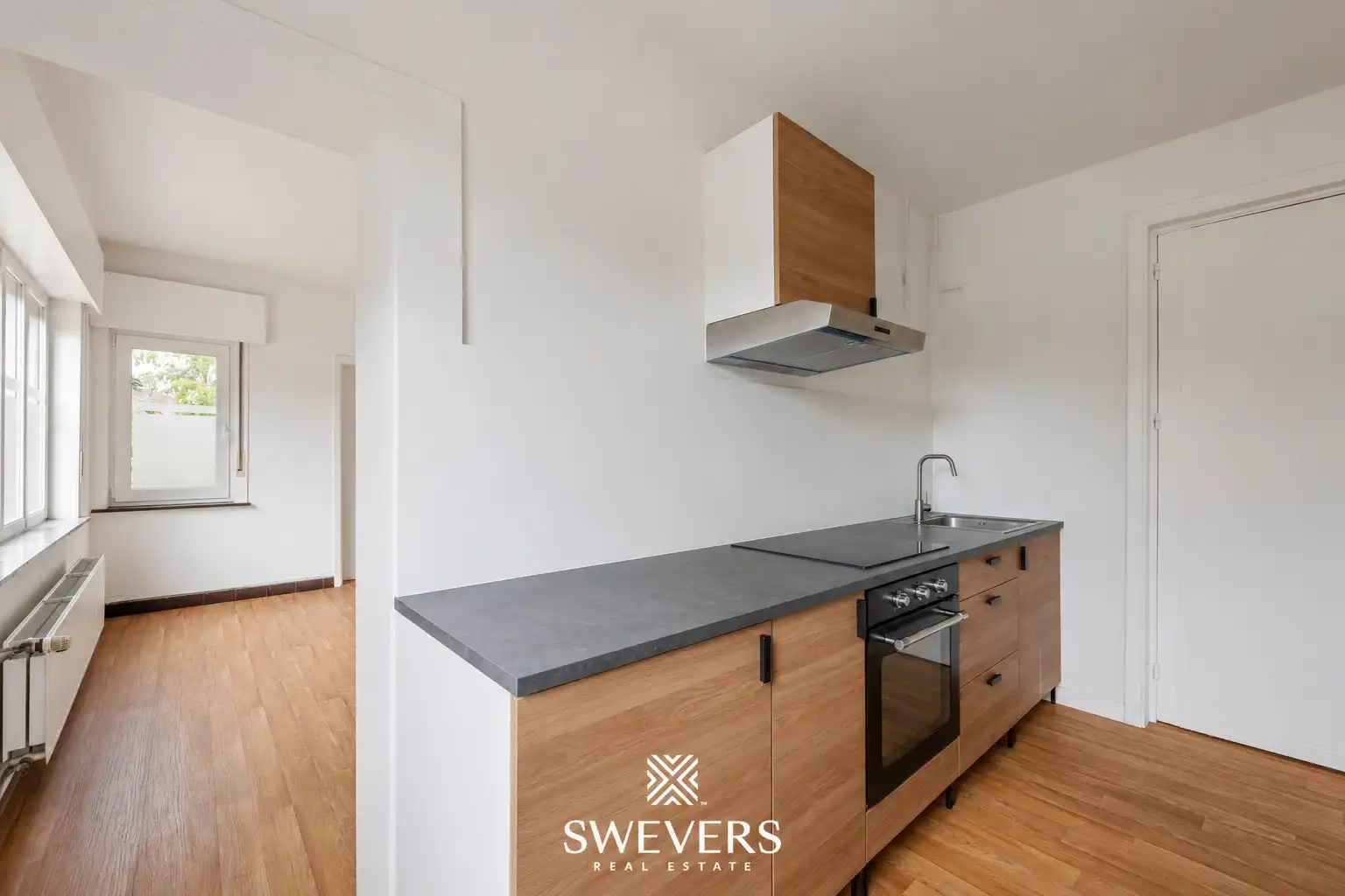 Te renoveren woning met 4 slaapkamers en 4 garages te Beringen foto 10