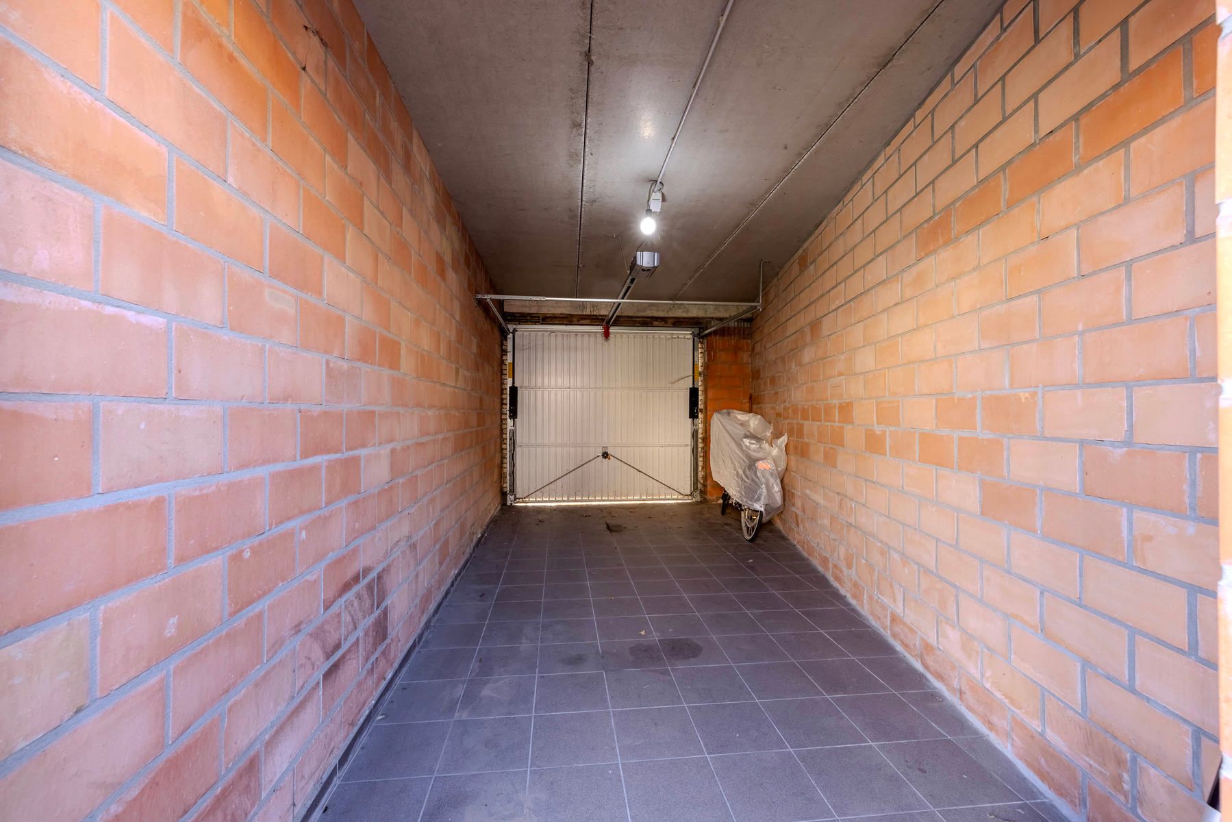 GLV app (132m²) met 2slpk, terras, garagebox en kelder foto 20