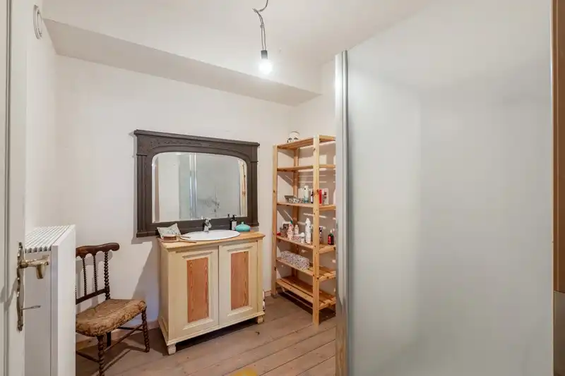 Handelsruimte met woonappartement in het centrum van Wommersom foto 18