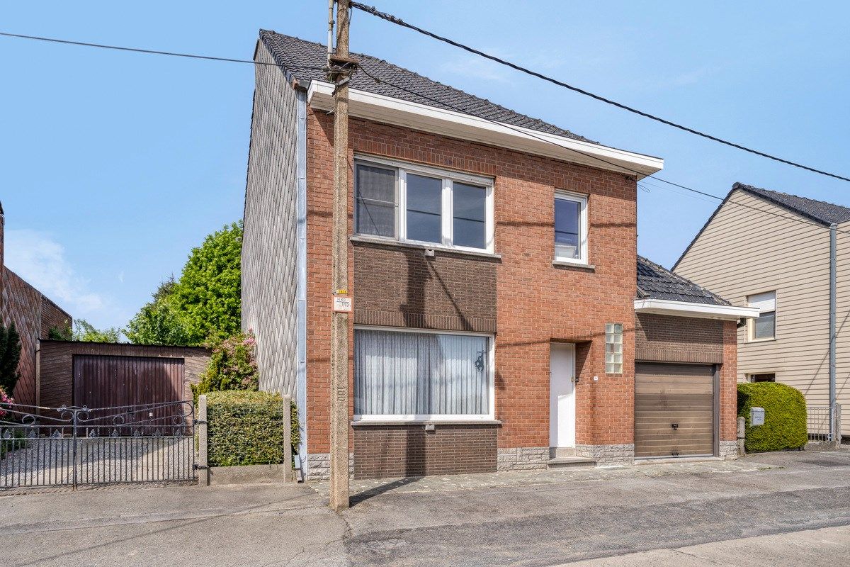 Te renoveren woning met naastliggend bouwperceel! foto 3
