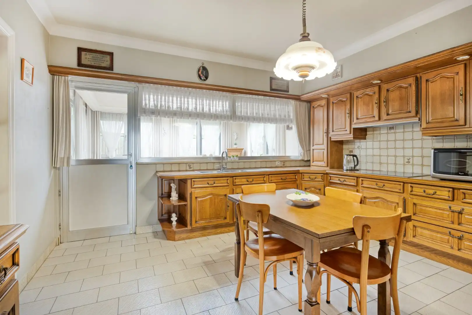 Ruim ingedeelde gelijkvloers woning op een mooi breed perceel van 812 m². foto 11