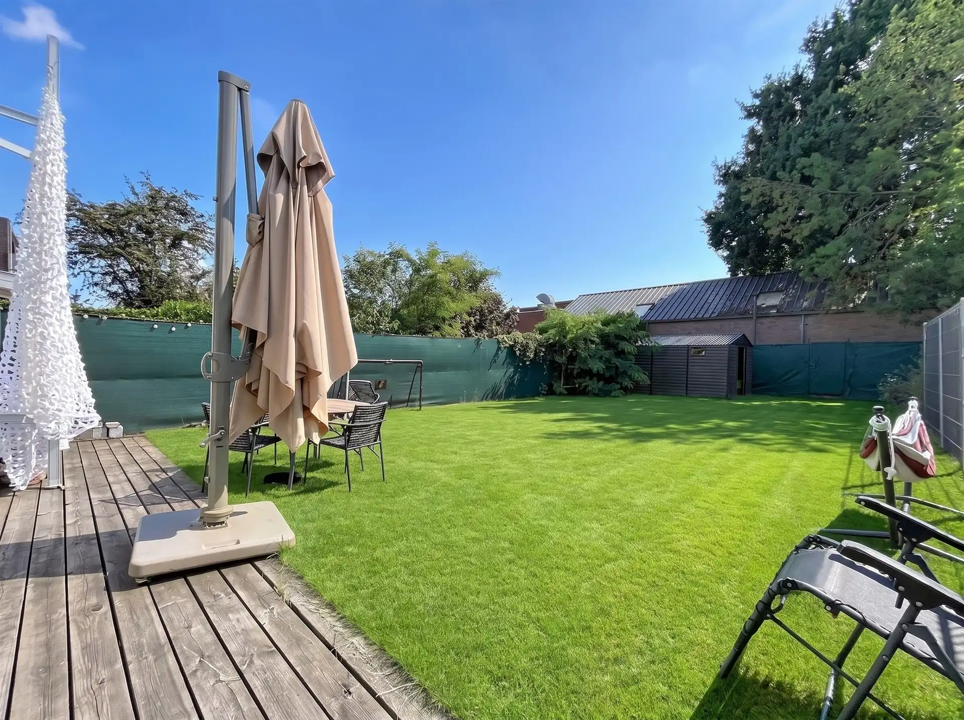 Modern gelijkvloers appartement met tuin van 200m²! foto 7
