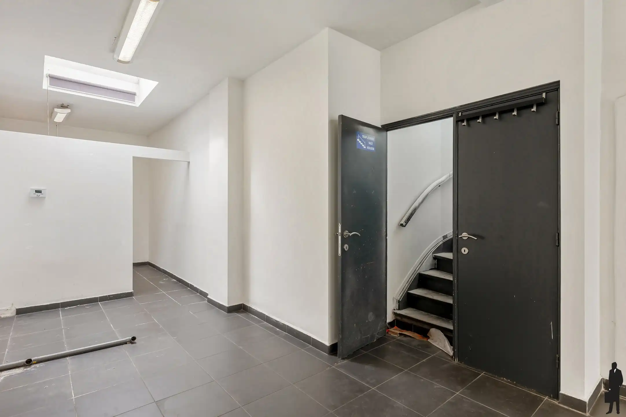 Handelsgelijkvloers met gerenoveerde triplex in het centrum! foto 6