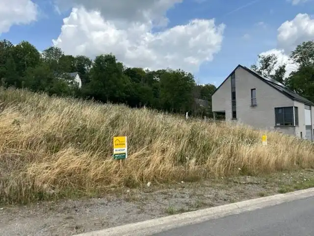 Bouwgrond met unieke ligging nabij centrum van Barvaux-sûr-Ourthe foto {{pictureIndex}}