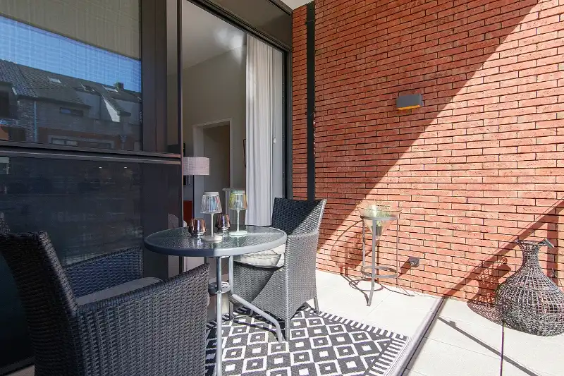 Luxueus ingericht appartement met 2 slaapkamers in de gezelligste straat van Genk foto 14