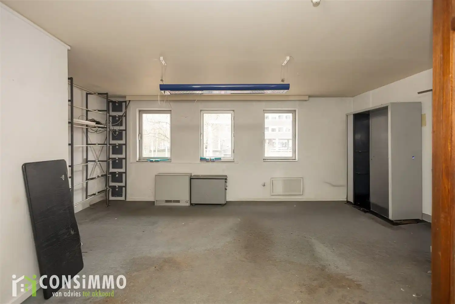 Handelspand met appartement in het centrum van Genk foto 7