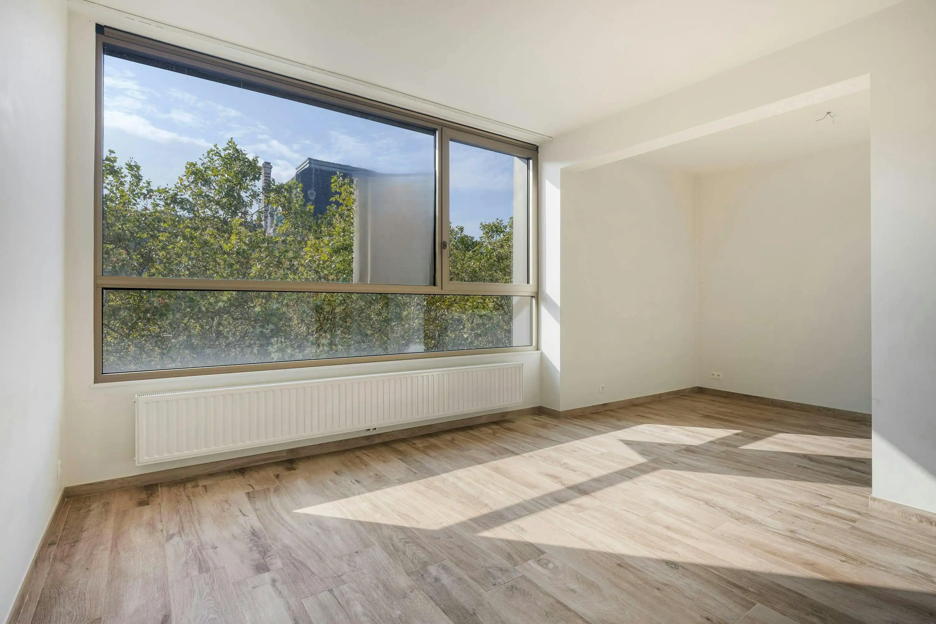 Appartement met twee slaapkamers en terras in Antwerpen te koop  foto {{pictureIndex}}