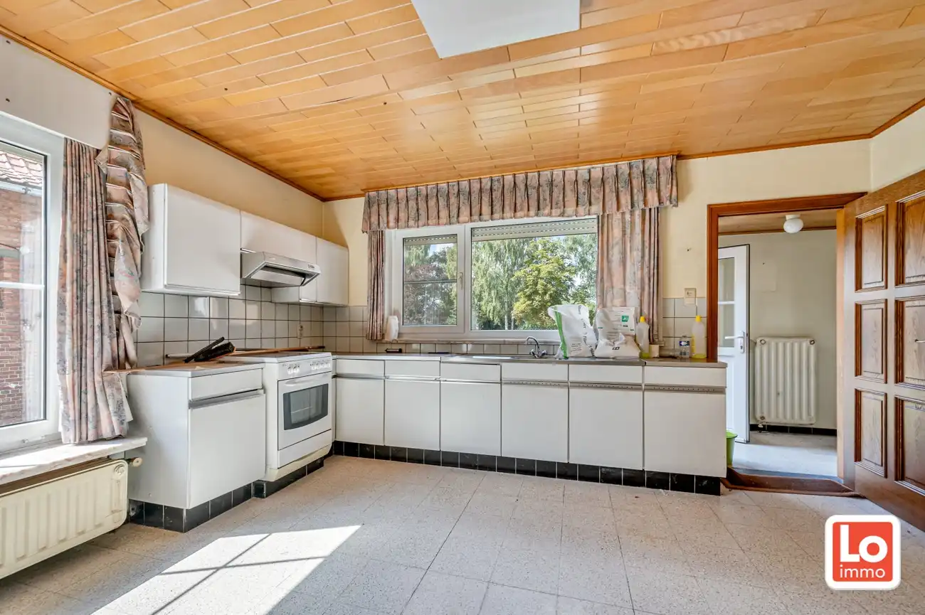 VERKOCHT! Ideaal gelegen groot perceel bouwgrond/projectgrond in het centrum van Kalken! foto 18