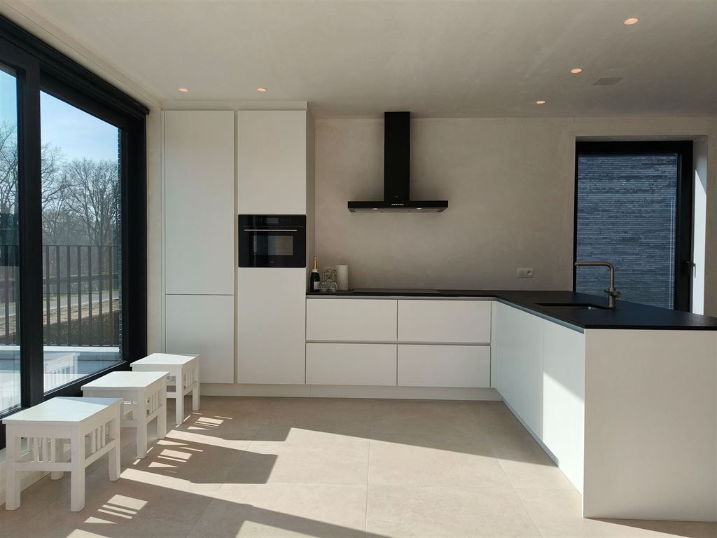 Moderne half-open nieuwbouwwoning met zicht op de Kempische Vaart foto 3