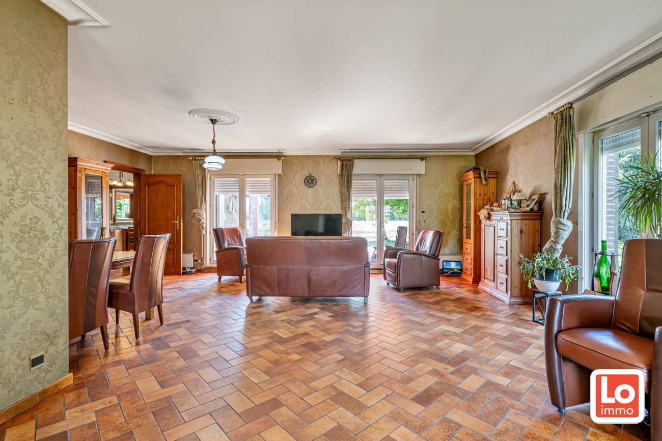 Ruime te renoveren open villa met inpandige garage op een héél rustige toplocatie met open zicht in Lochristi! foto 8