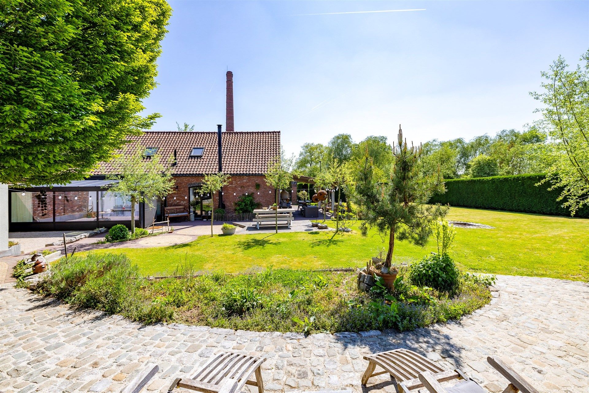 Karaktervolle open bebouwing met loods op groot perceel foto 36