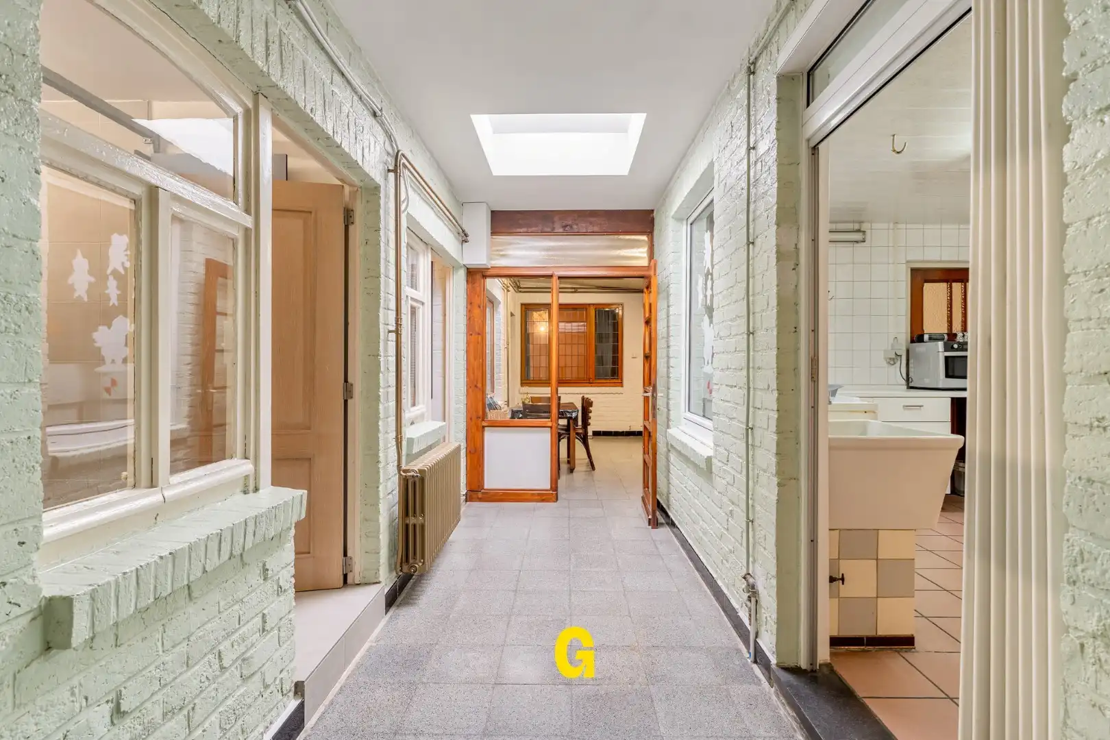 Te renoveren woning met 3 slaapkamers, inpandige garage en tuin foto 8