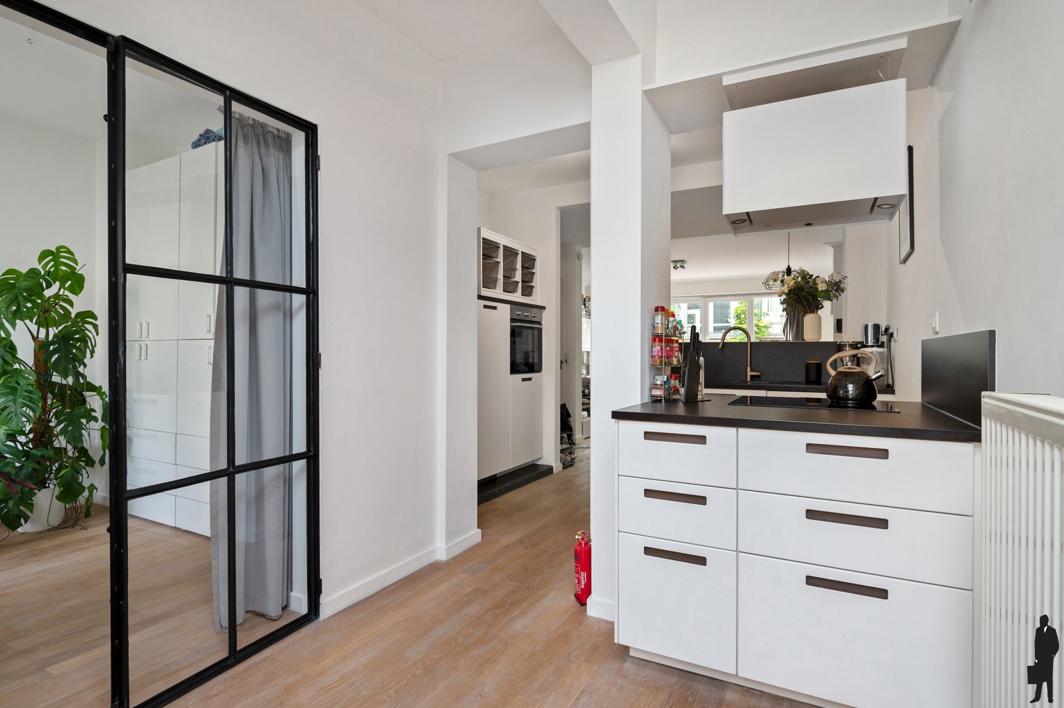 Lichtrijke duplex met tuin in Zurenborg foto 8
