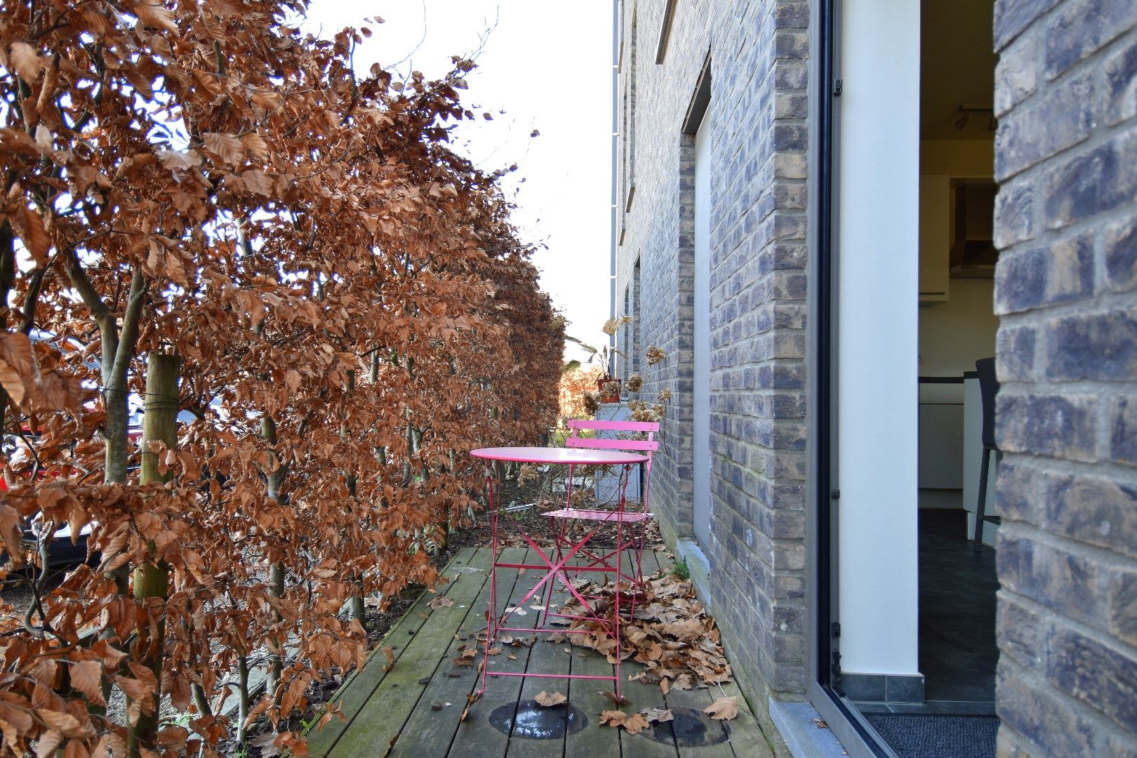 Recent 1-slaapkamerappartement (BJ 2017) met autostaanplaats te koop in een groene omgeving te Heule foto 3