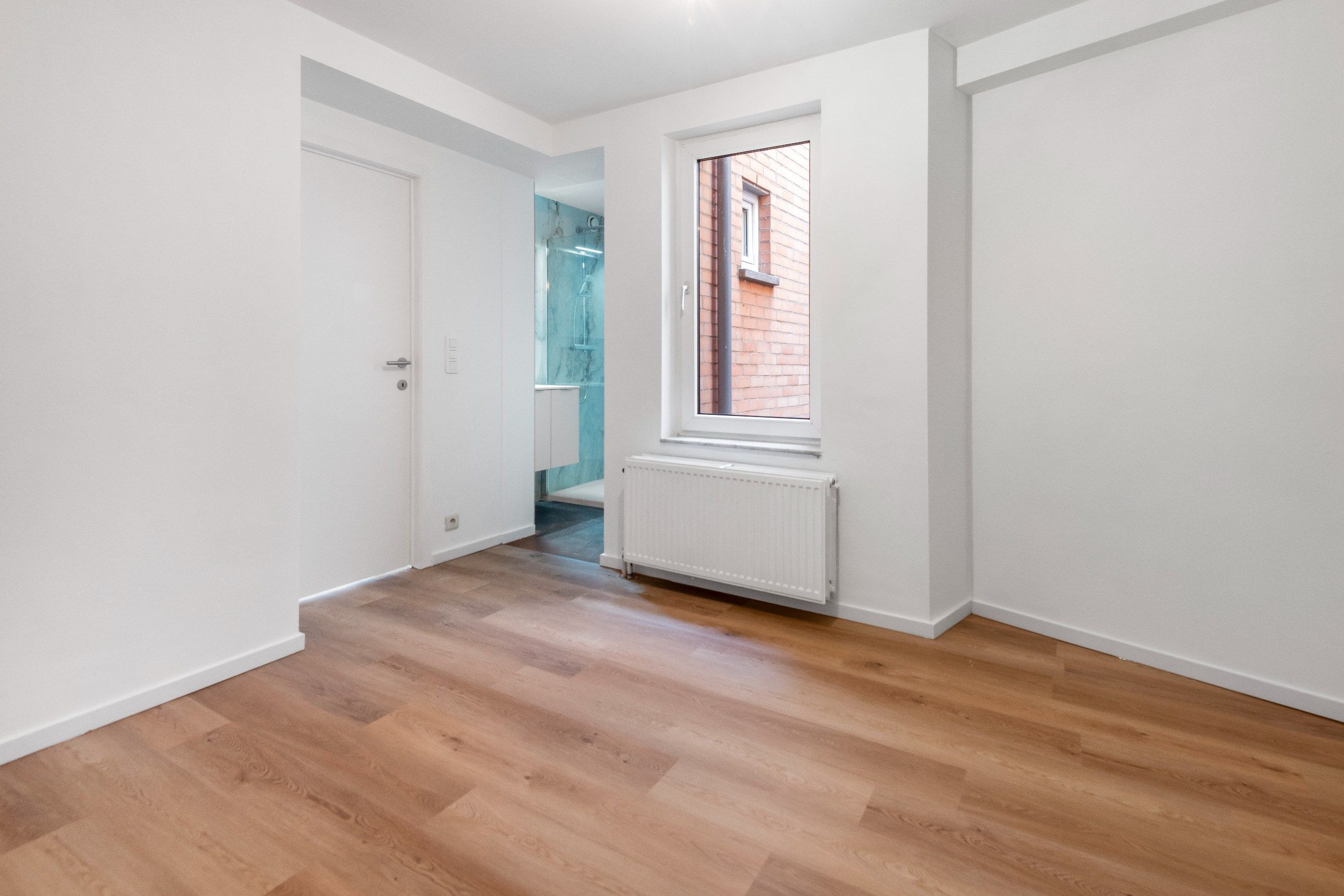 Gezellig appartement in een kleine residentie centraal gelegen vlakbij de winkels van de Lippenslaan. foto 8
