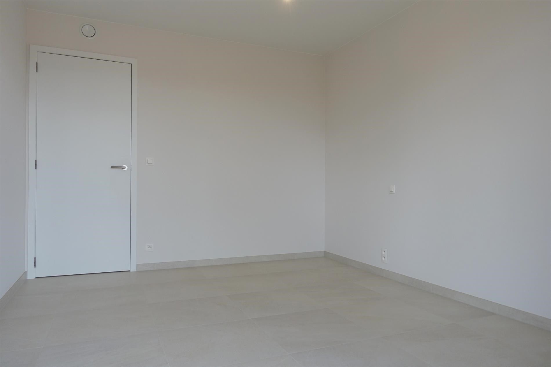 Prachtig nieuwbouwappartement met garage foto 14