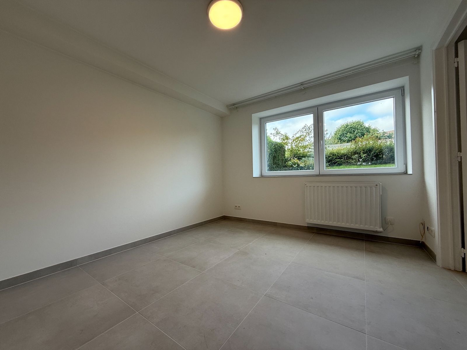 Gerenoveerde studio met parking foto 4