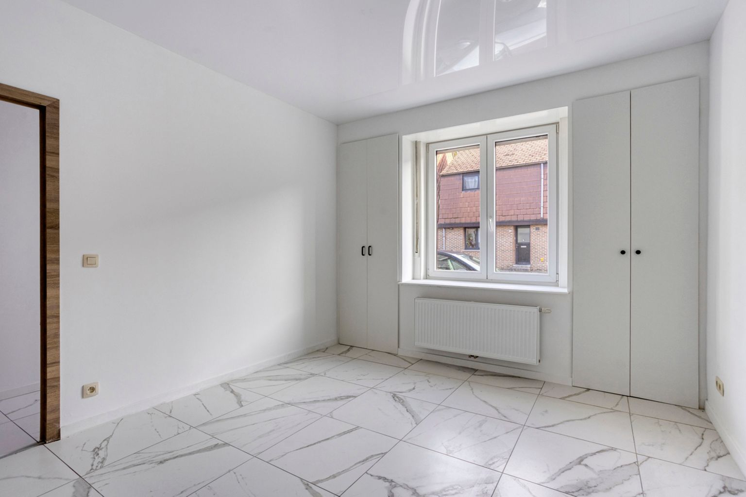 Volledig gerenoveerde gesloten bebouwing te Drogenbos foto 3