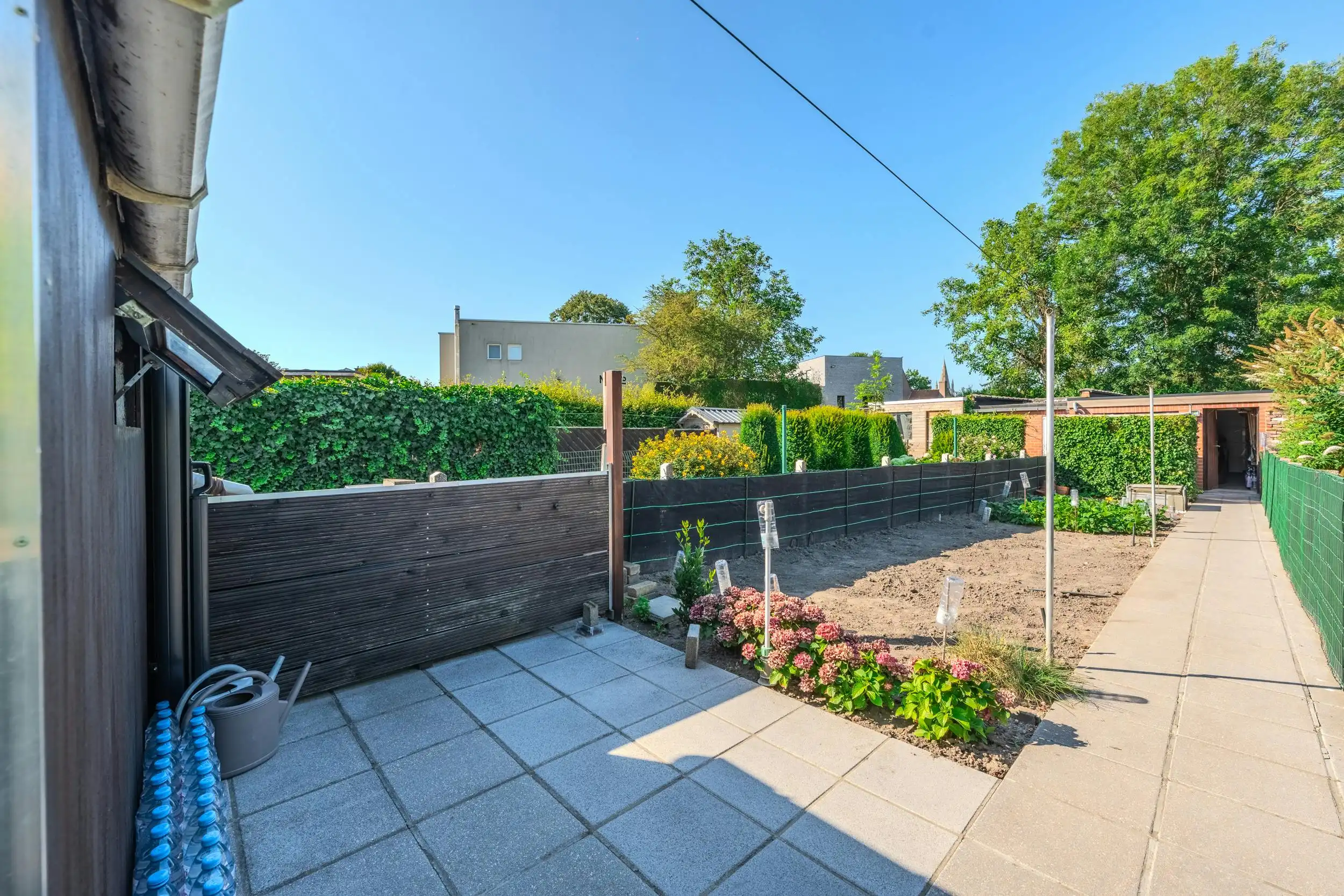 Huis te koop in Ieper met zongerichte tuin én garage foto 17