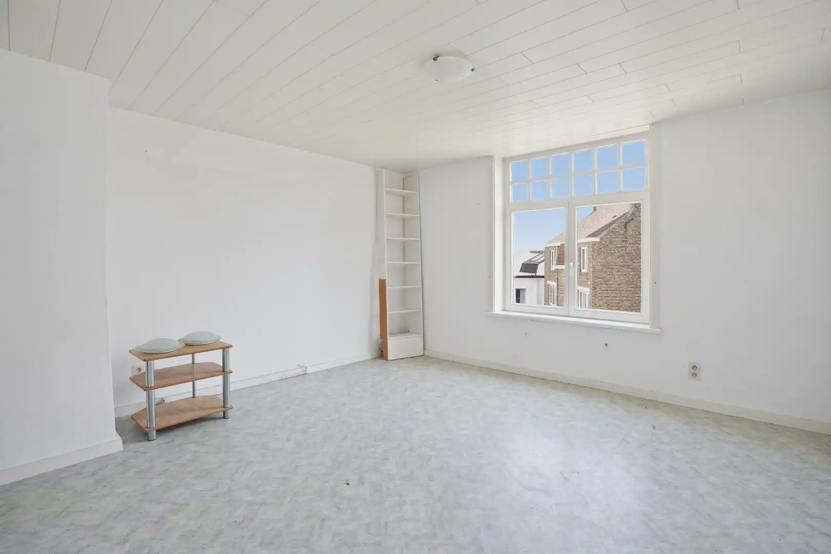 Goed gelegen gebouw op 117m² te De Panne bestaande uit een handelsruimte en woonst.  foto 18