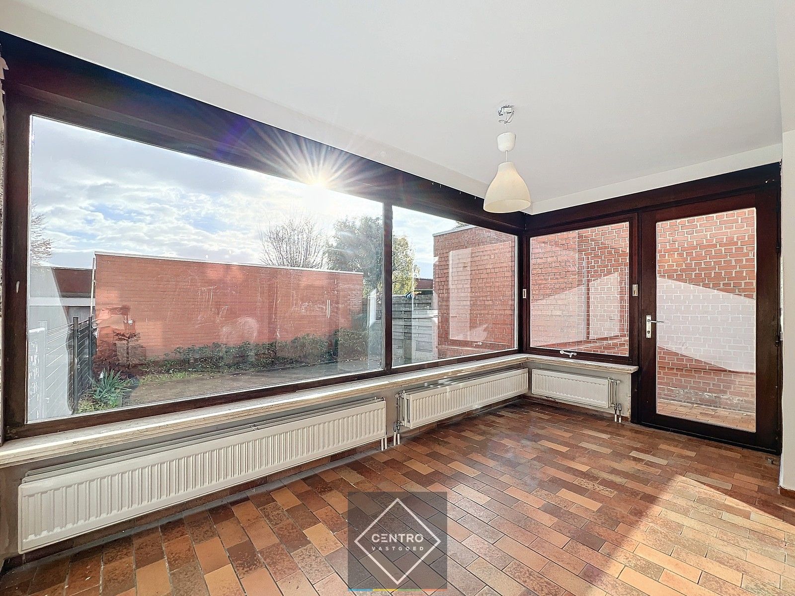 Betaalbaar app. (85m²) met 2 slpks, kelderberging en TERRAS van 50m² ! foto 2