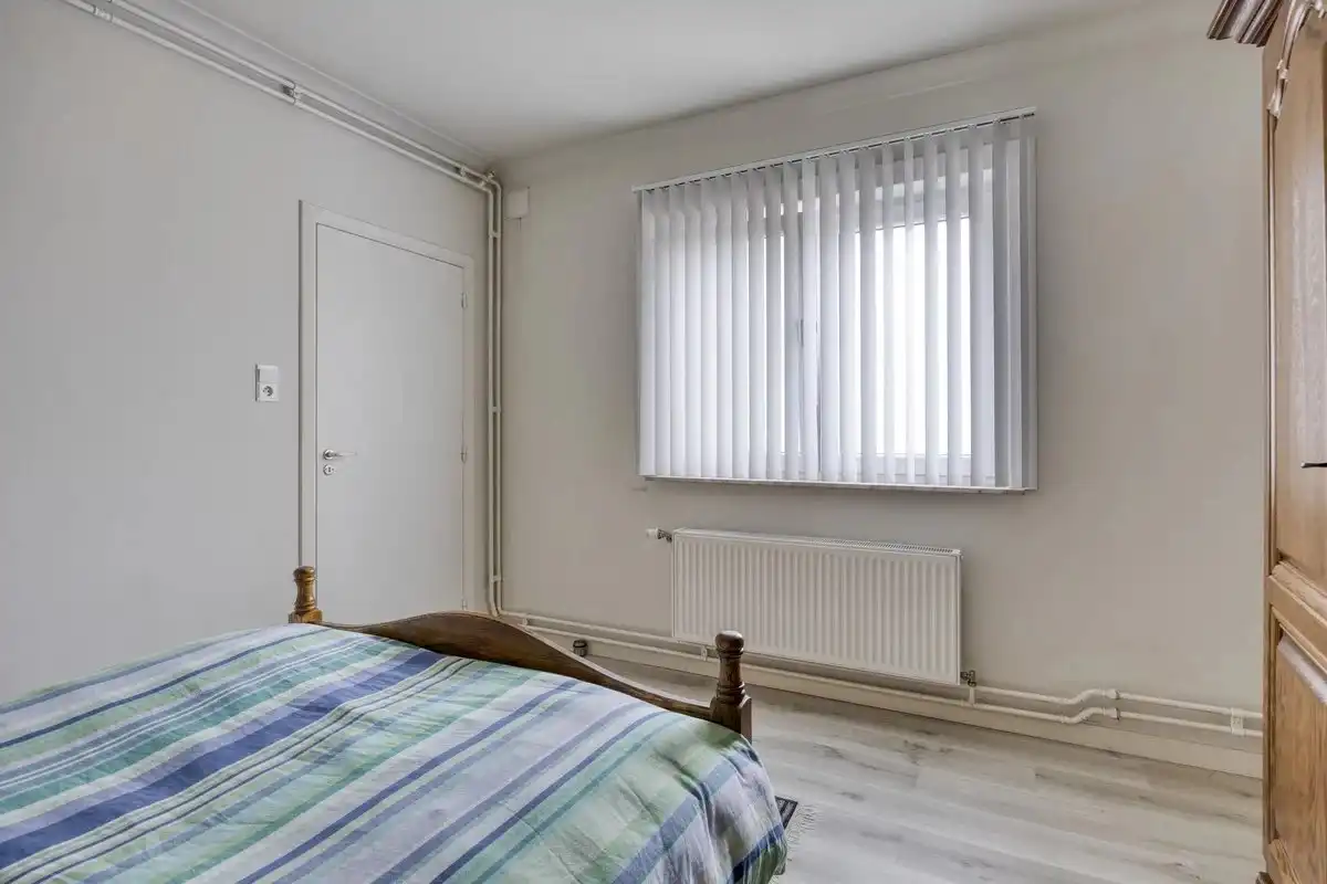 OPBRENGSTEIGENDOM BESTAANDE UIT TWEE RUIME EN VERHUURDE APPARTEMENTEN IN HERK-DE-STAD foto 30