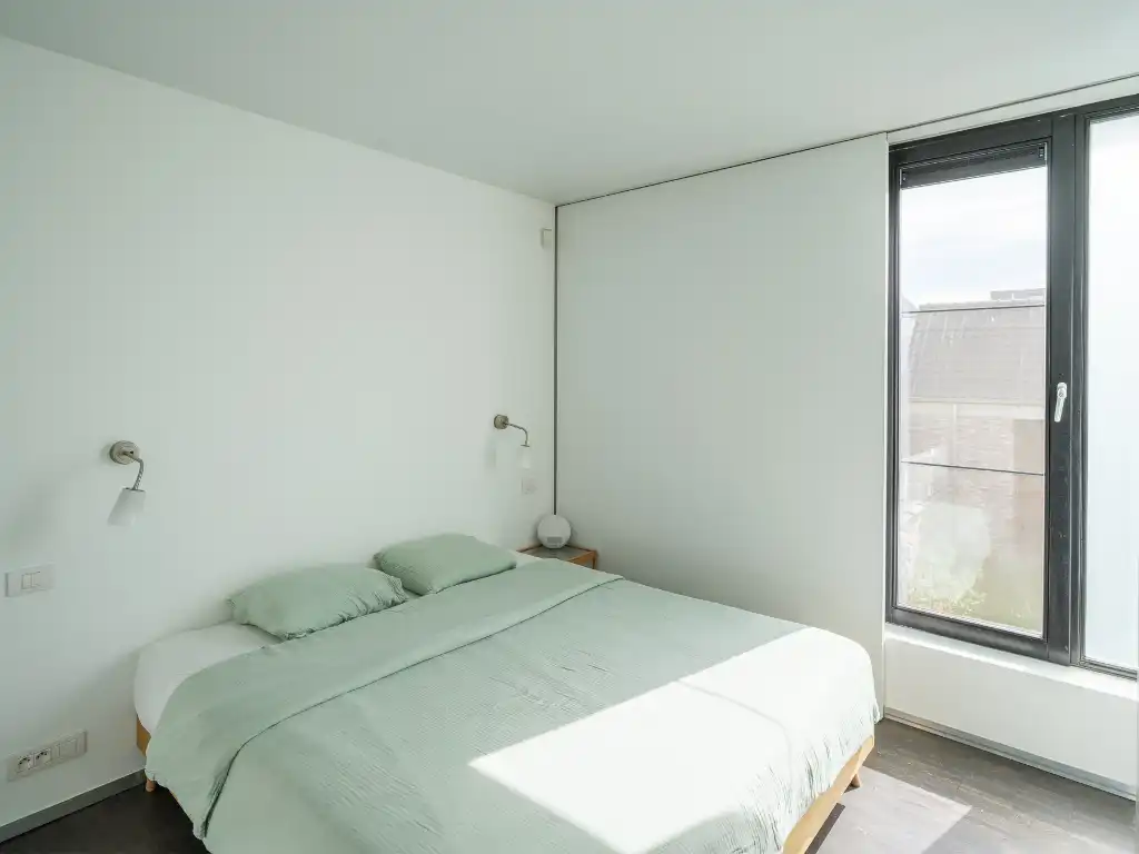 Architecturale burgerwoning naar de hand van Enplus architecten met stadstuin en polyvalente achterbouw op een boogscheut van het stadscentrum. foto 18