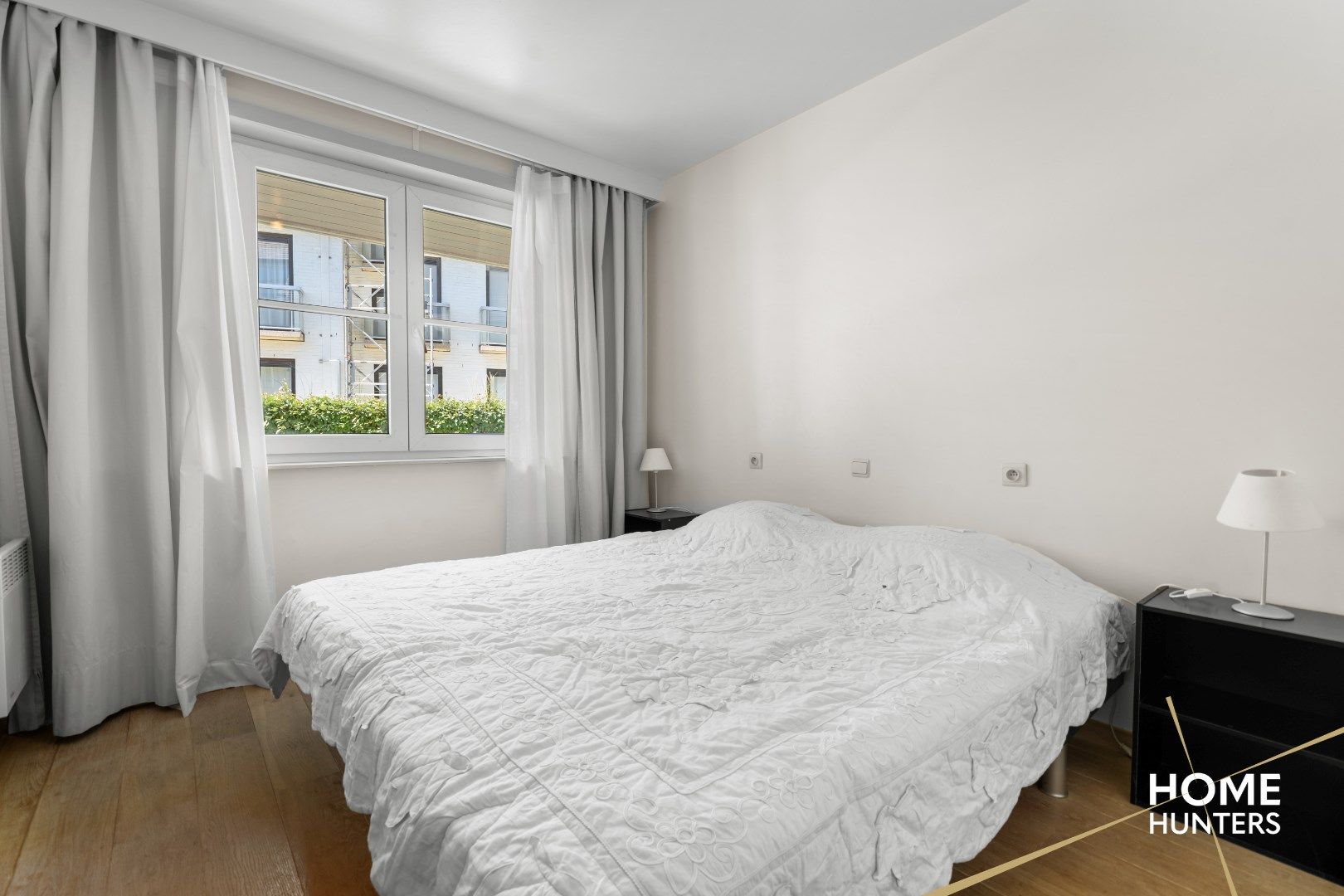 Uniek 2 slaapkamer appartement met zicht op zee en duinen foto 16