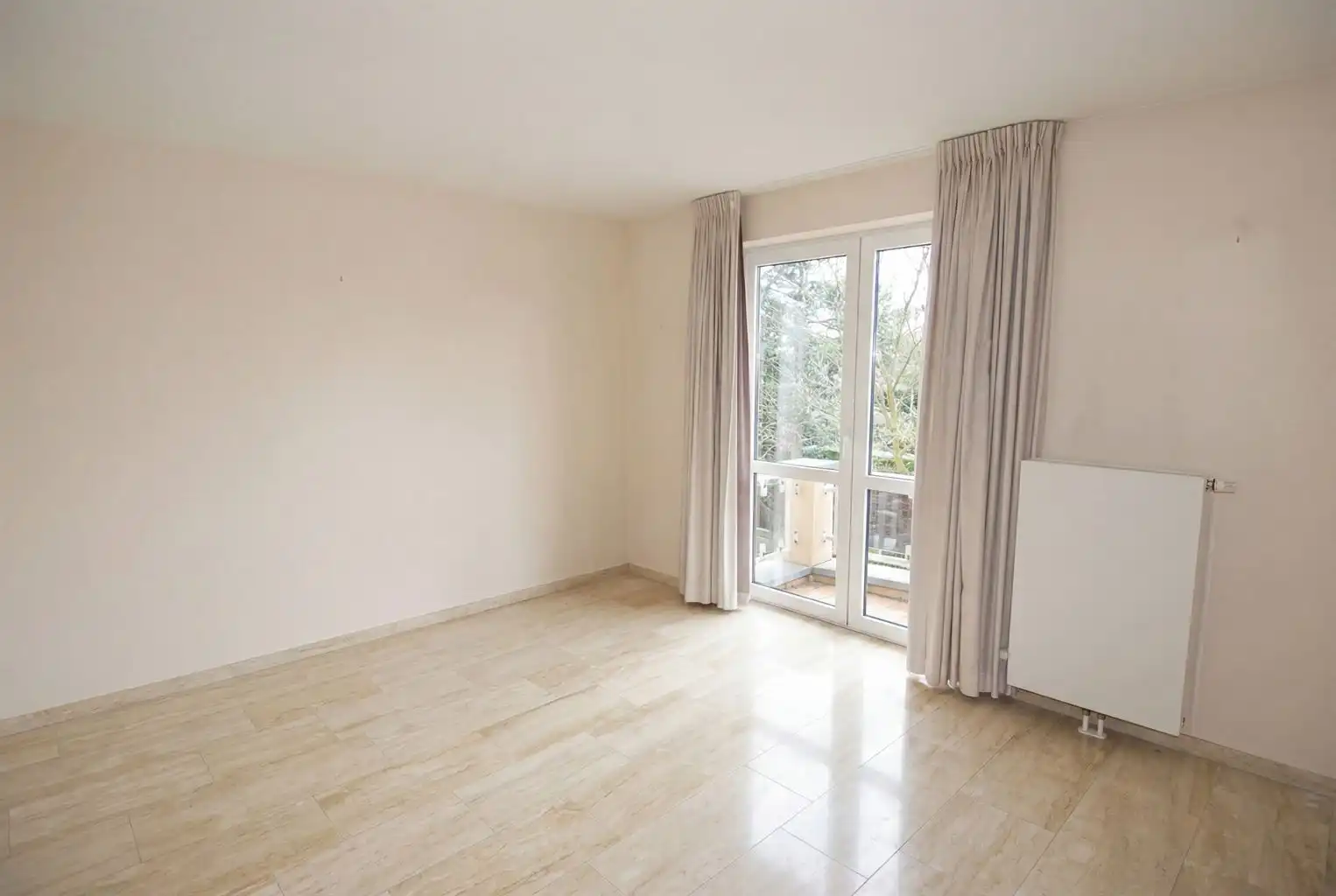 Ruim appartement met 2 slaapkamers, 2 terrasjes en ondergrondse autostaanplaats foto 6