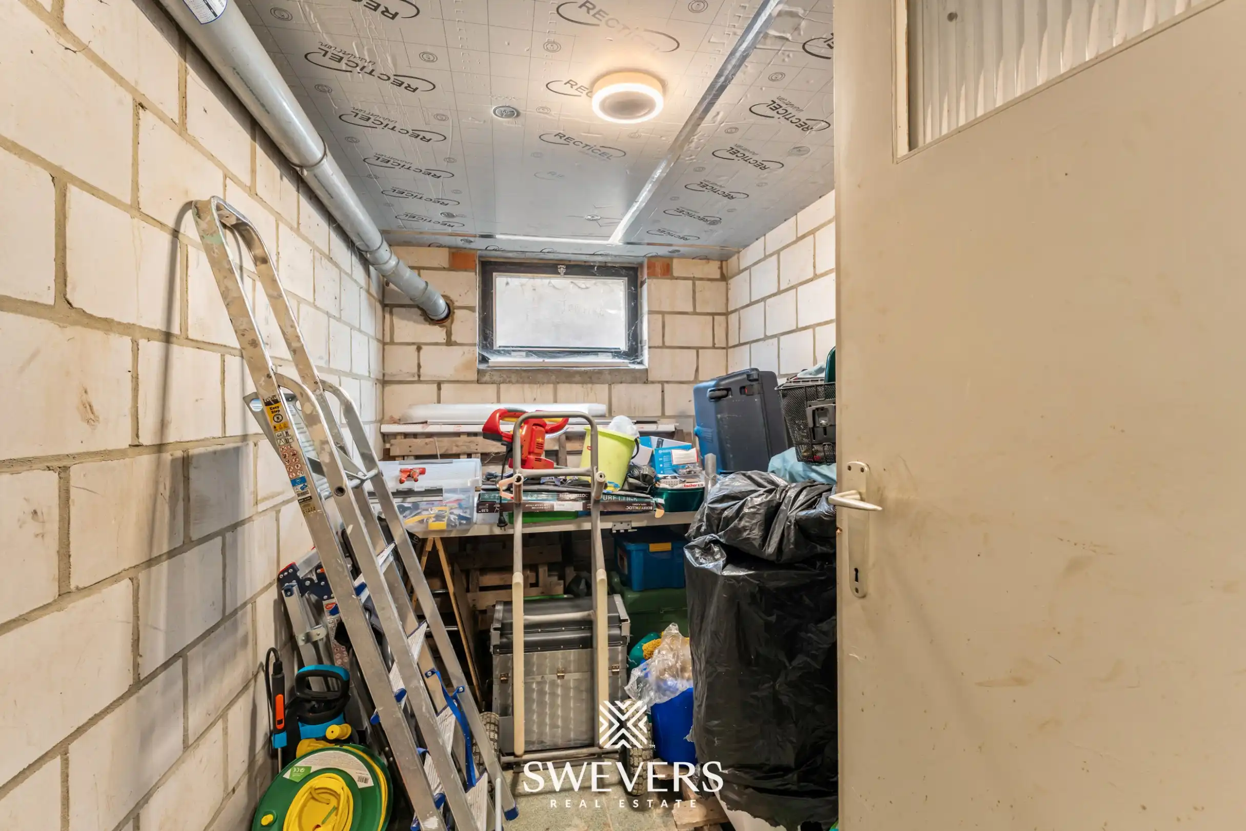 Gerenoveerd appartement met garagebox en kelderberging foto 16