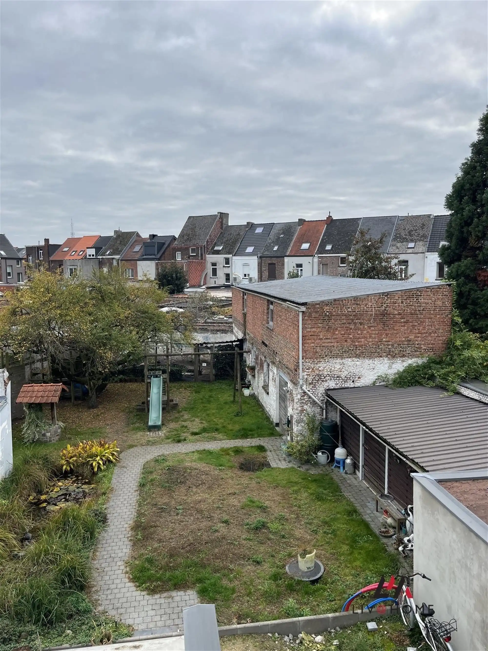 2 aangrenzende rijwoningen met gemeenschappelijke tuin foto 18