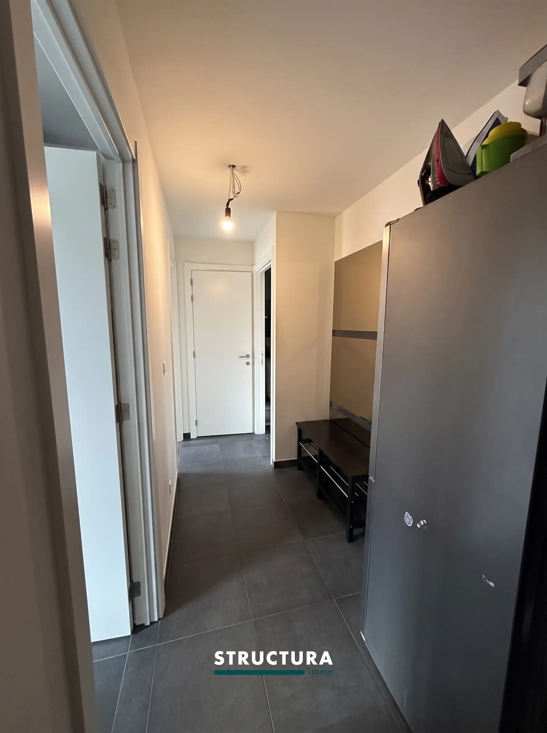 Appartement met ruim terras, staanplaats aan de Markt foto 8