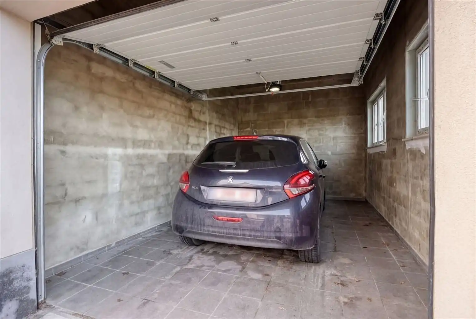 Zeer ruim 4-slaapkamerappartement met ruime terrassen en een afgesloten garage, gelegen nabij het centrum van Maaseik. foto 19