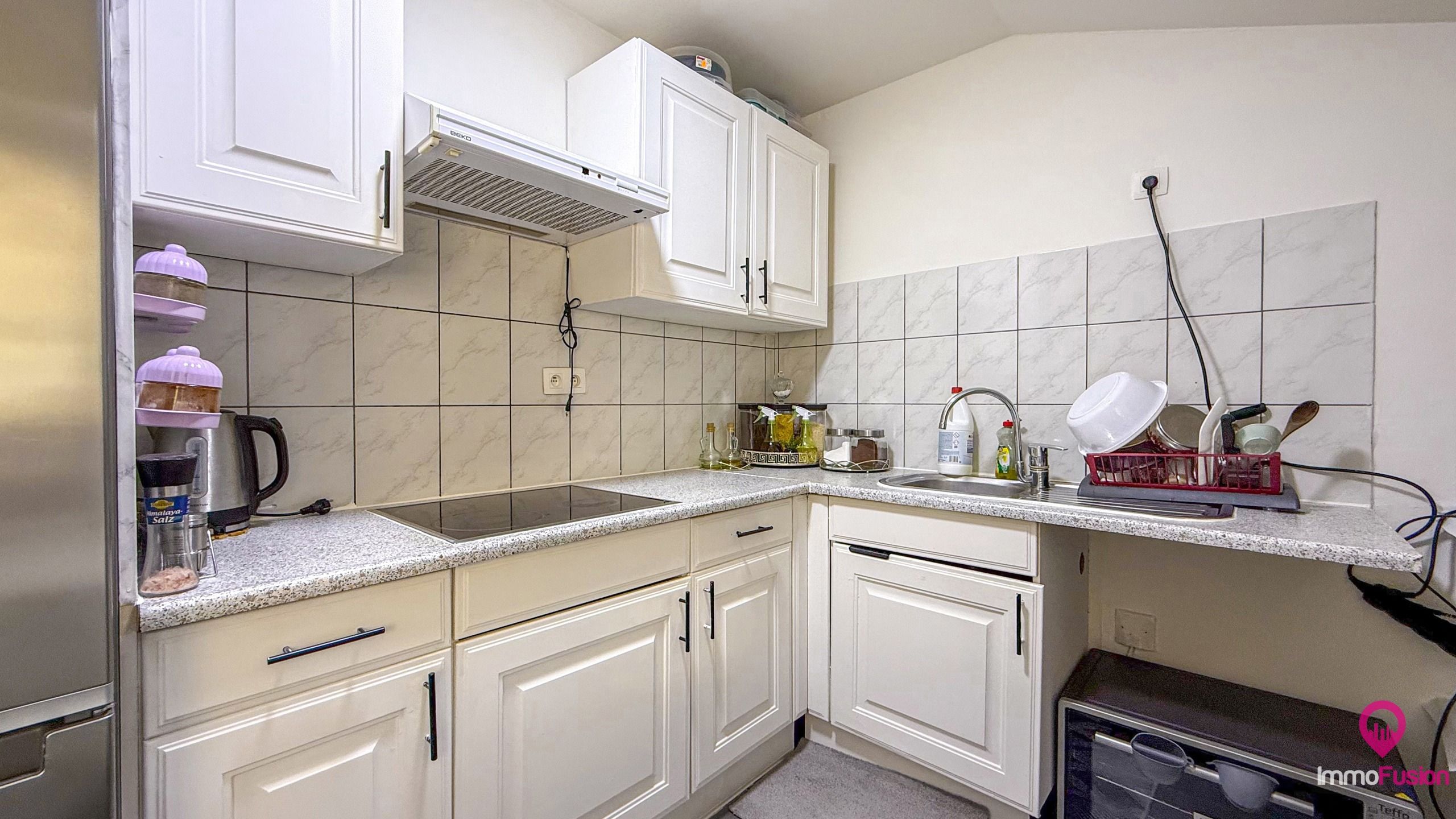 Instapklaar appartement met 2 slaapkamers, balkon en parking! foto 9