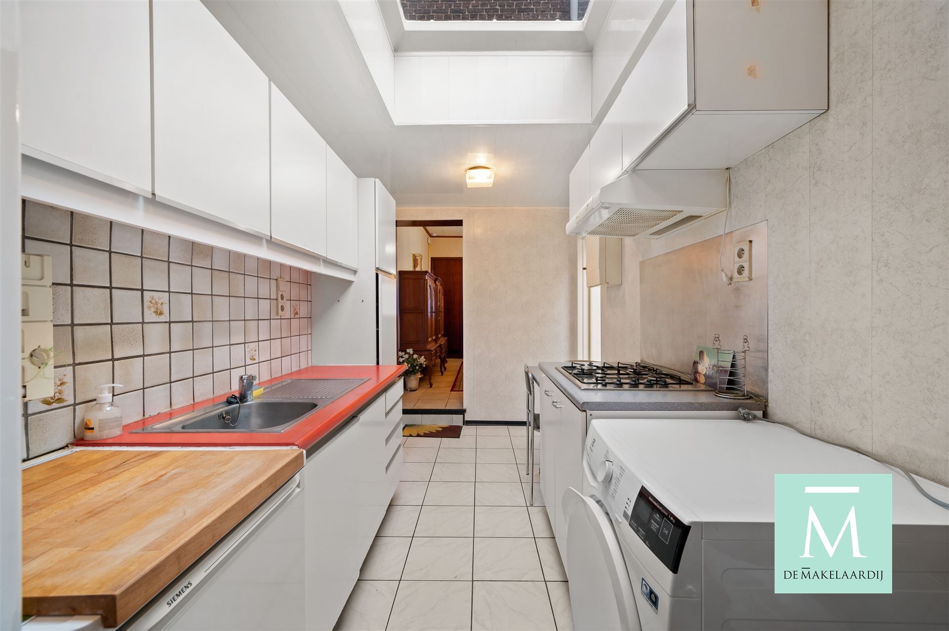 Te renoveren gezinswoning met mooie tuin in Mechelen-Zuid foto 6