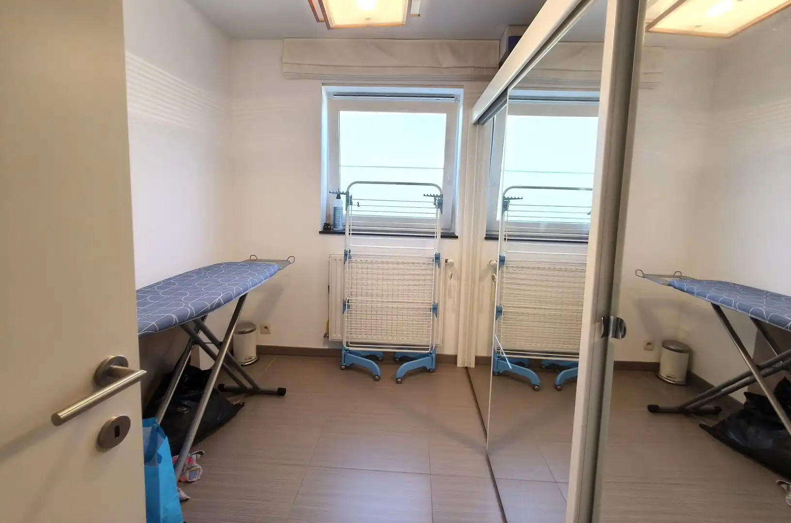 RUIM GELIJKVLOERS APPARTEMENT MET TUIN EN GARAGE foto 7