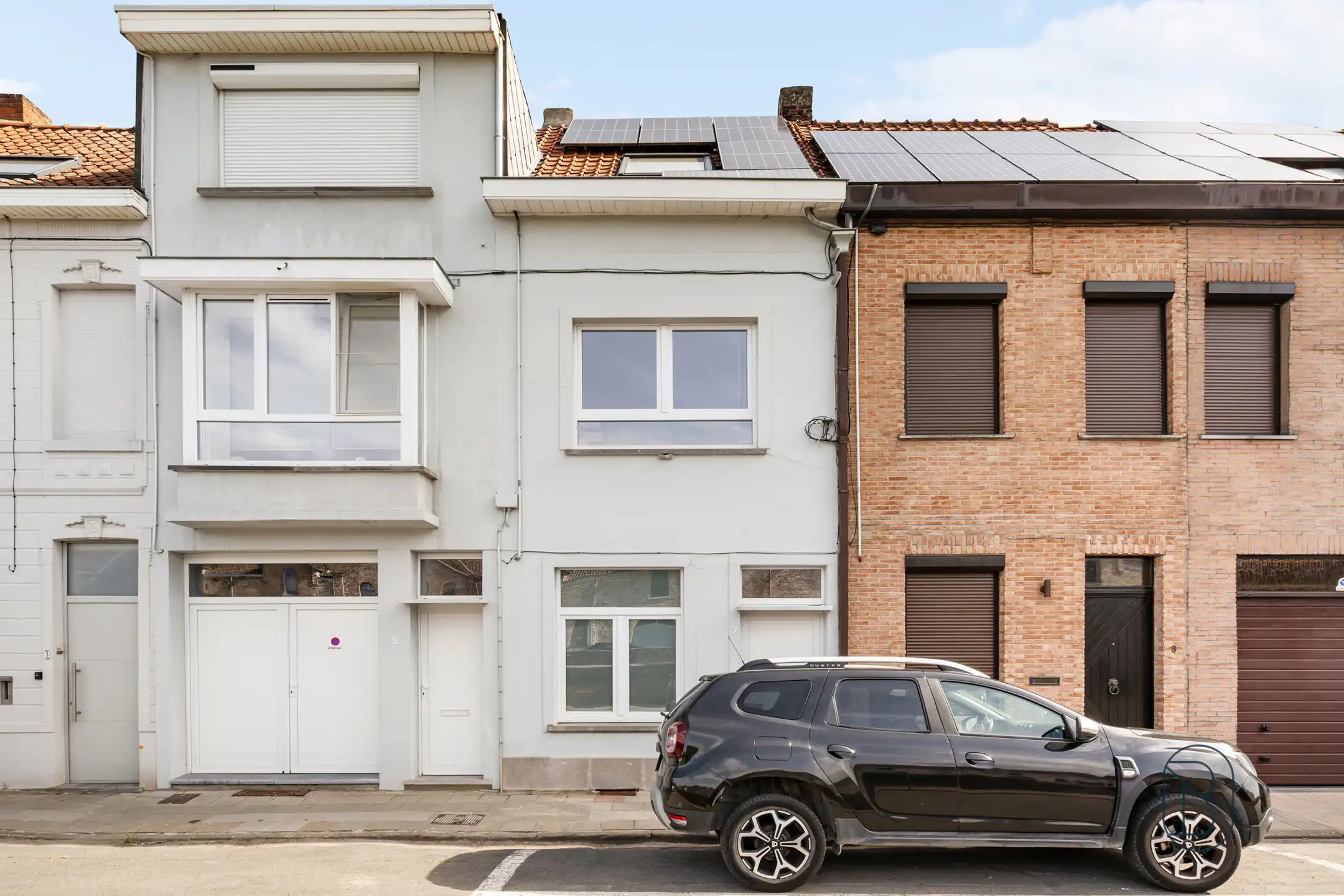 Instapklare woning met zonnige tuin in het hart van Kortrijk foto 9