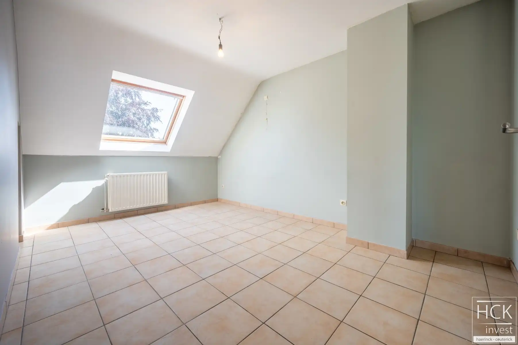 KRUISHOUTEM - Instapklare woning met 3 SLPK, garage én zonnige tuin foto 17