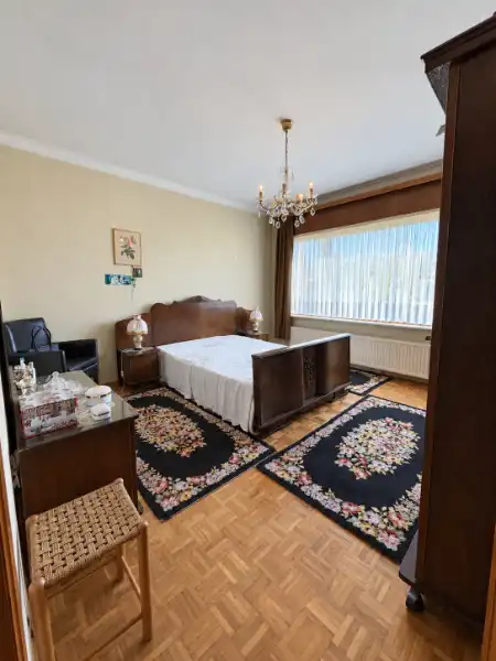 Ruime woning op 1.000 m² met park achter de tuin en 4 slaapkamers foto 8
