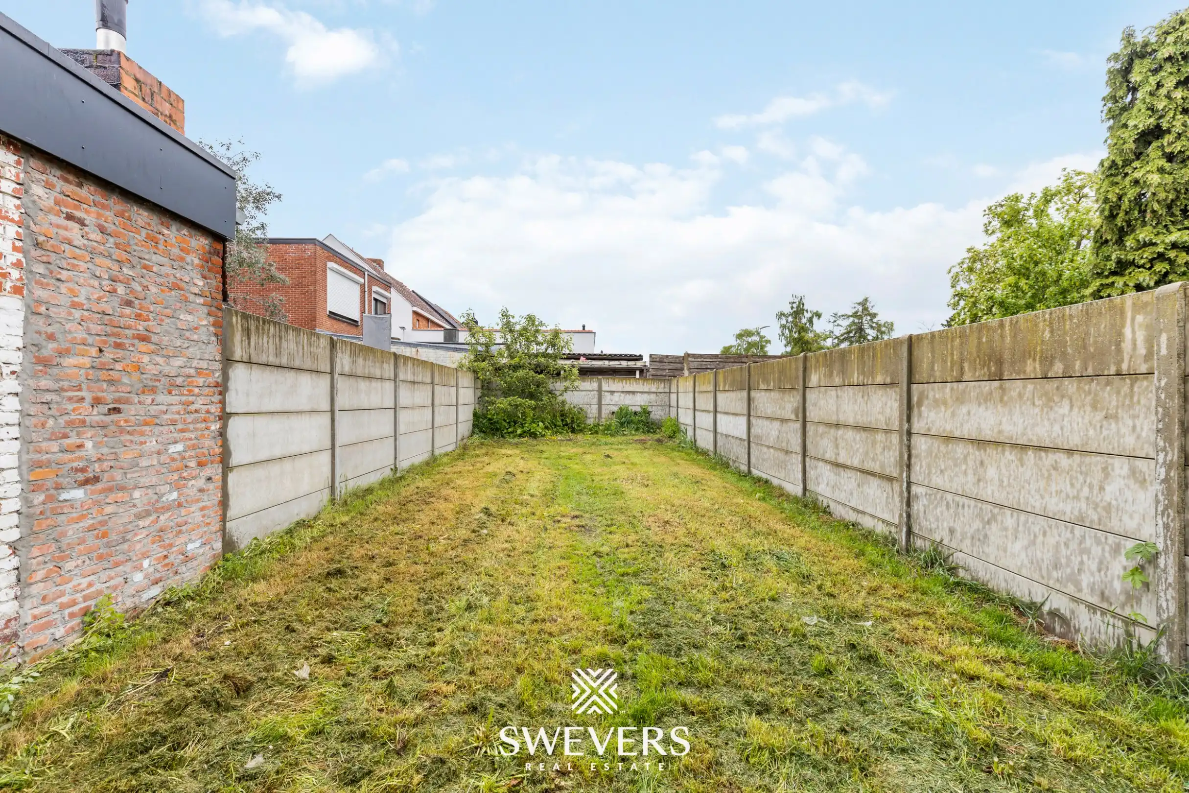 Instapklare en energiezuinige rijwoning met tuin, terras en garage in hartje Leopoldsburg foto 24