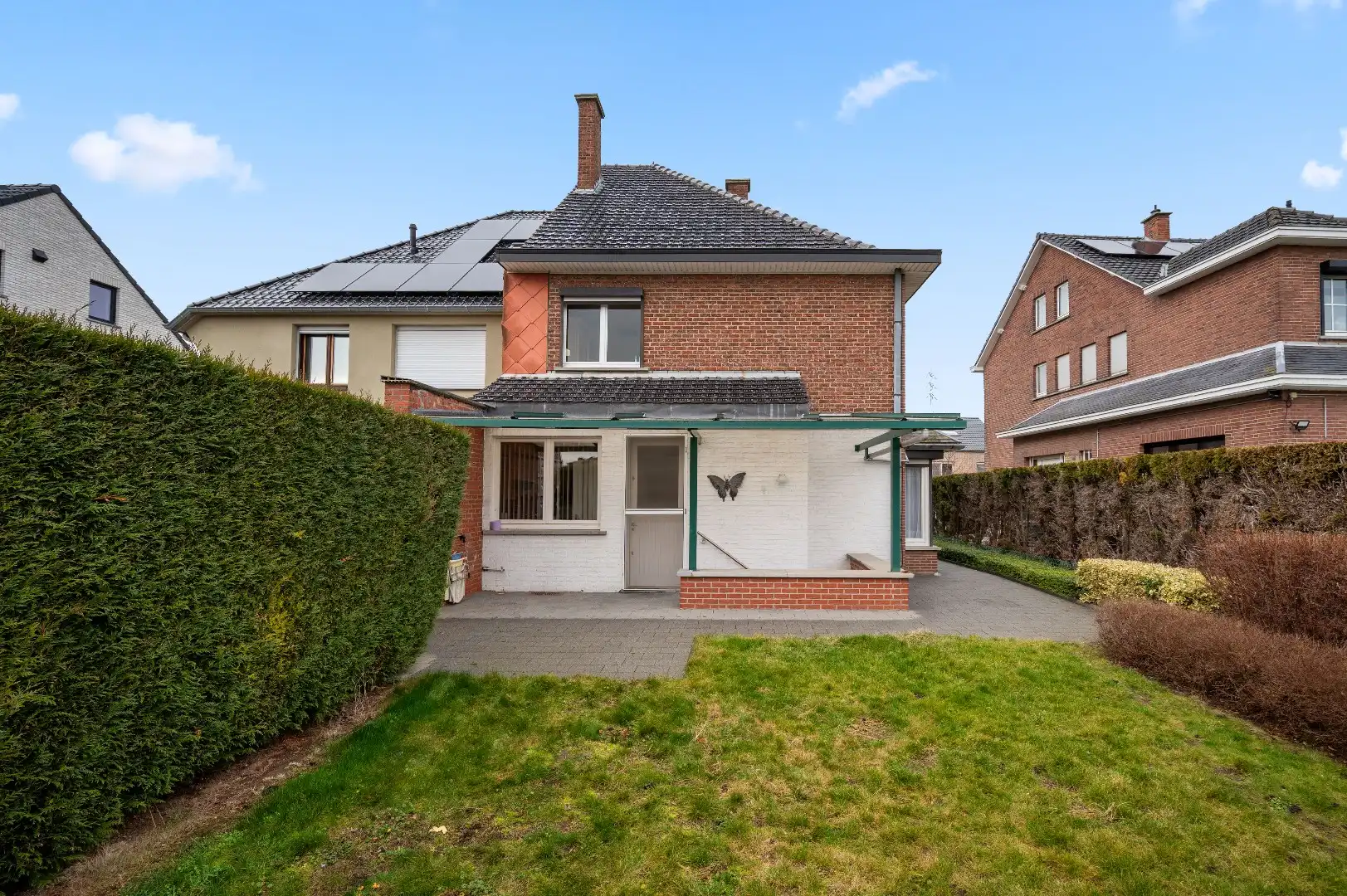 Op te frissen halfopen bebouwing op de Tiense stadsrand foto 24