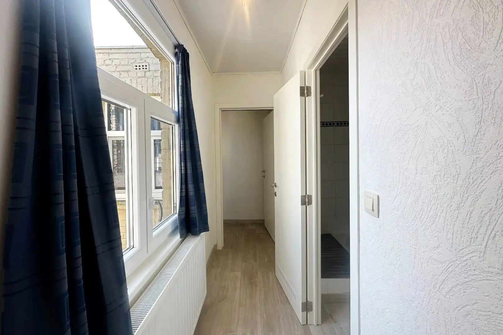 Prachtige interbellumwoning onderverdeeld in drie ruime appartementen foto 8