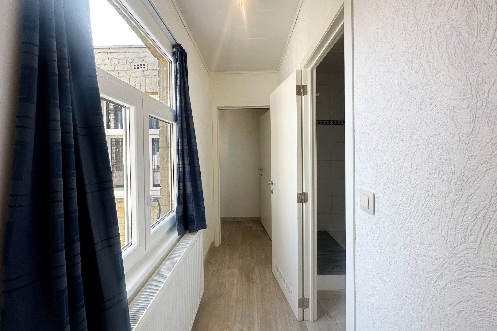 Prachtige interbellumwoning onderverdeeld in drie ruime appartementen foto 8