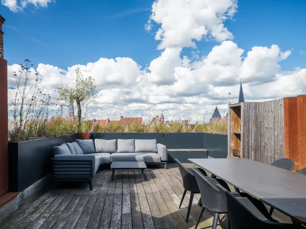 Stijlvol en lichtrijk appartement met uitzonderlijk terras in het historisch centrum van Gent. foto 2