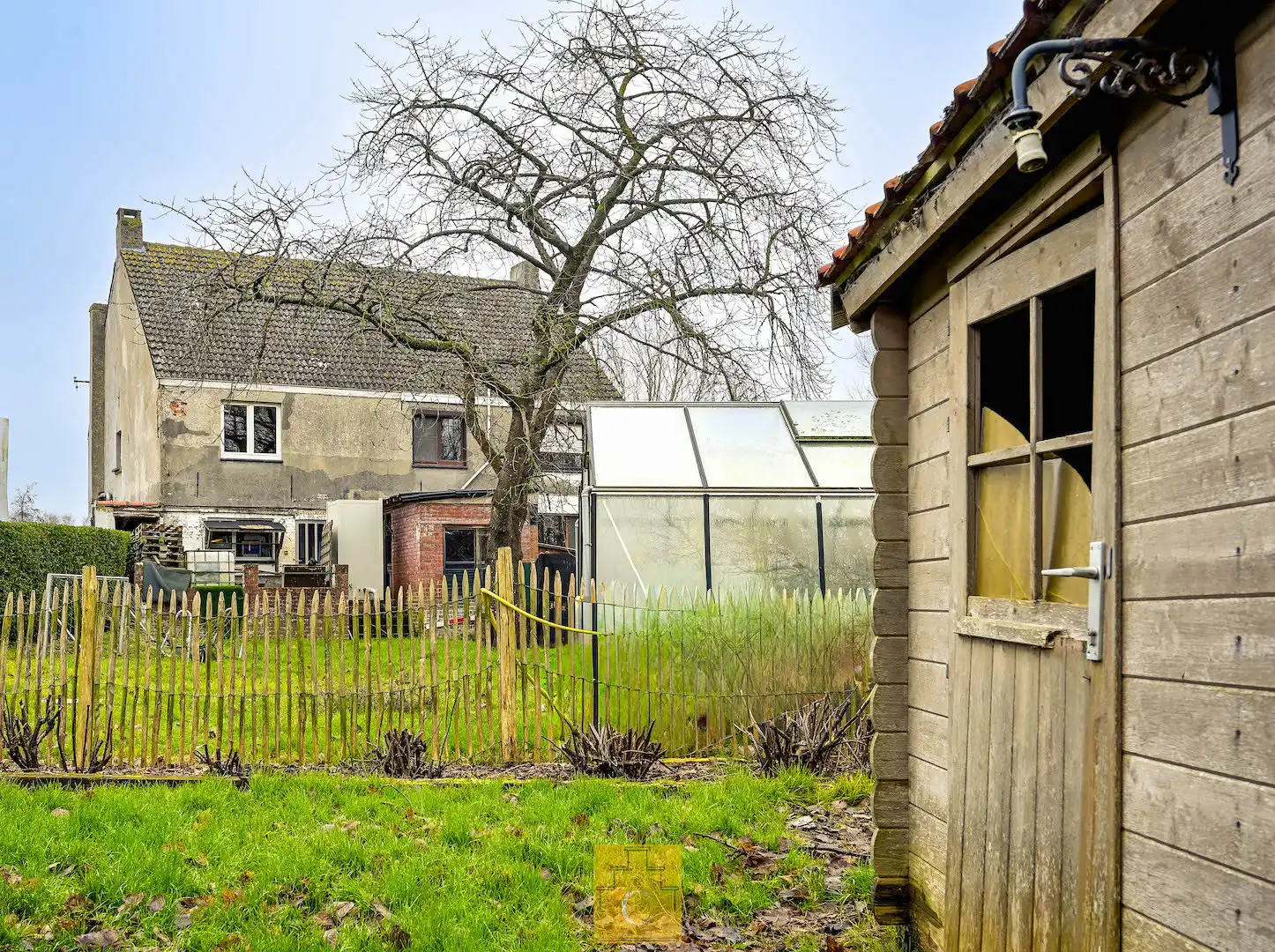 Uniek geheel van TWEE WONINGEN met bijgebouw, idyllisch gelegen aan de vaart foto 11