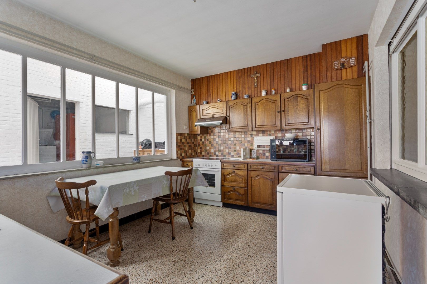 Ruime woning met bebouwbare tuin en achterliggende gronden foto 9